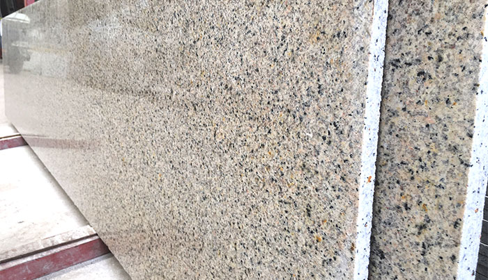 nên lựa chọn tấm nhựa PVC vân đá ốp tường hay tấm đá tự nhiên?